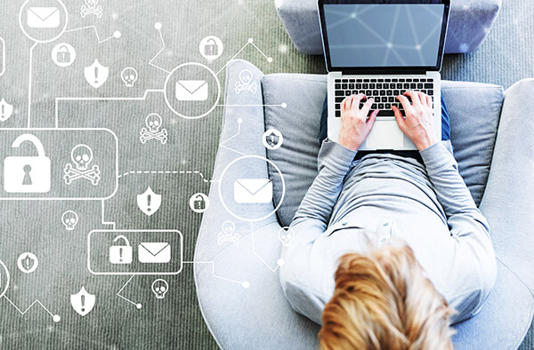 Top view of a woman working on her laptop computer